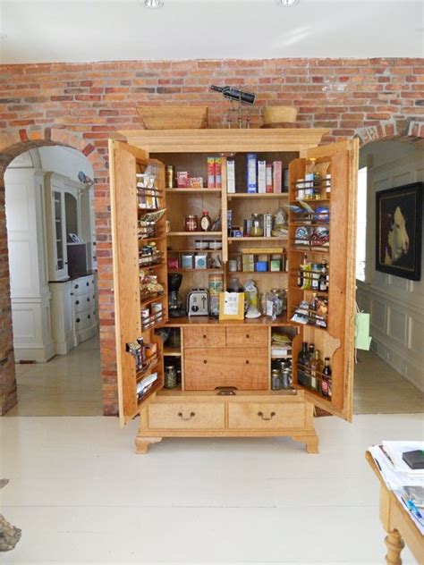 Turn An Old Armoire Into Kitchen Cabinet Space Organization