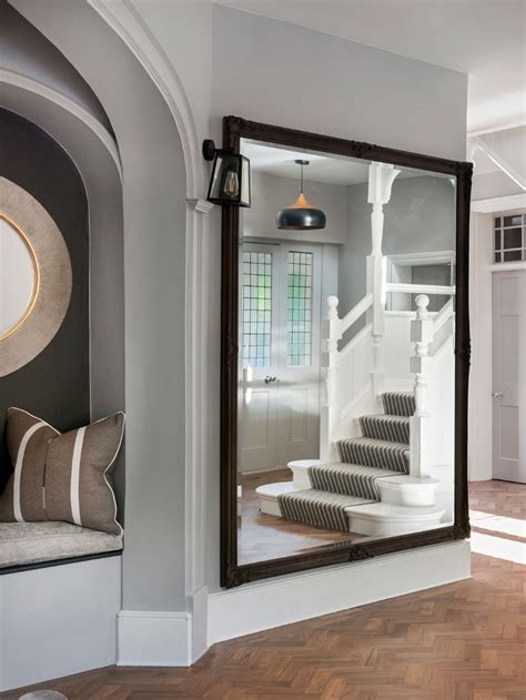 Large black entrance hall mirror designed by April Hamilton Interior