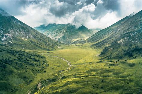 Aerial View Of Green Valley Between Mountains Of Caucasus Nature