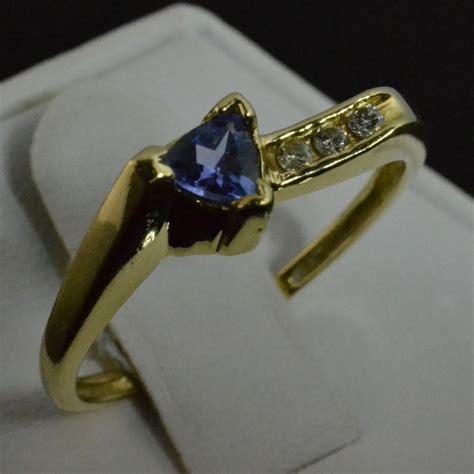 How do you buy gold in canada from banks if you don't know whether your branch carries any? 14K Yellow Gold Solitaire Tanzanite & Accent Diamond Ring ...