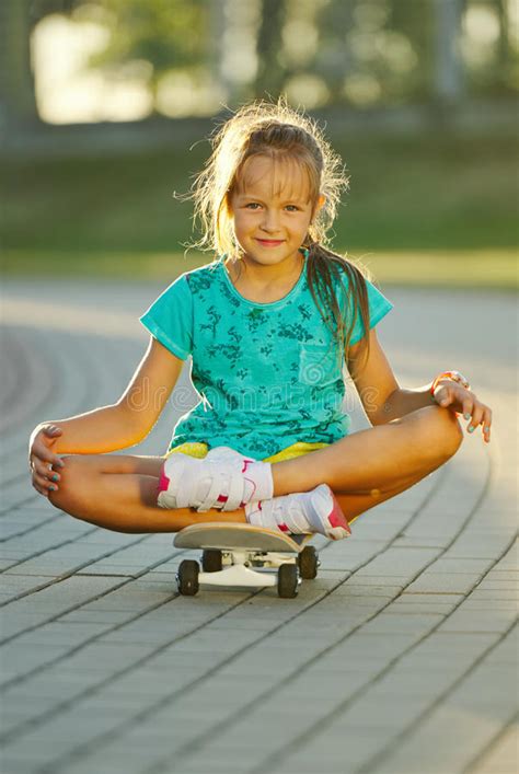 Photo Of Cute Little Girl With Skateboard Stock Photo Image Of