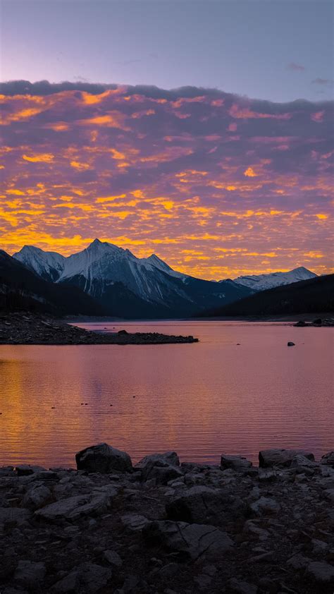 Download wallpaper 1350x2400 mountains, lake, sunset, stones, clouds ...