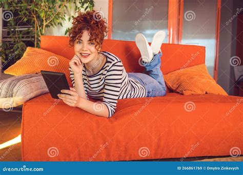 Ginger Girl Looking Relaxed Spending Time Online Stock Image Image Of