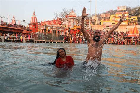 In Pics First Shahi Snan Of Kumbh Mela Thousands Of Devotees Take Dip In Holy Ganga