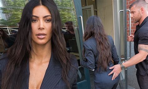 Kim Kardashians Bodyguard Puts His Hand On Her Backside Daily Mail