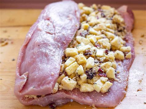 This roast pork loin recipe calls for rubbing a boneless pork loin with a simple blend of garlic and fresh herbs before roasting it to perfection. Pork Loin Roast with Apple Cranberry and Walnut Stuffing Recipe in 2020 | Pork loin roast ...