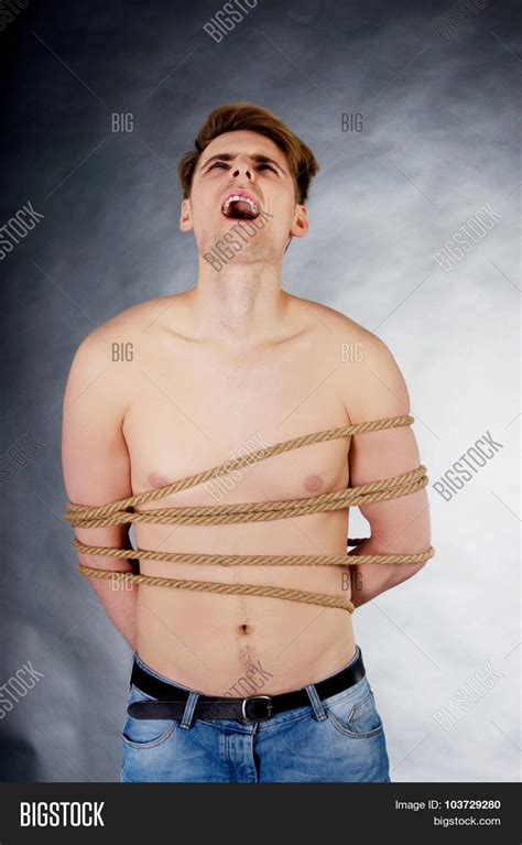 tortured shirtless man image and photo free trial bigstock