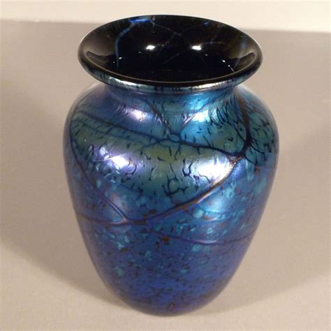 Start with a clean glass jar, decorative glass marbles (the kind that are flat on the back), and a hot but i definitely liked the little vase better. Iridescent Blue Elaine Hyde Art Glass Vase from ...