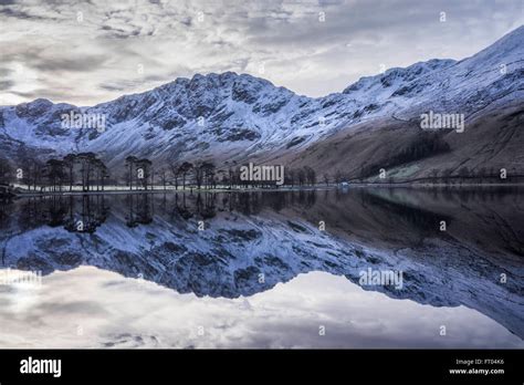 Buttermere Reflections At Sunrise On A Frosty Winter Morning Lake
