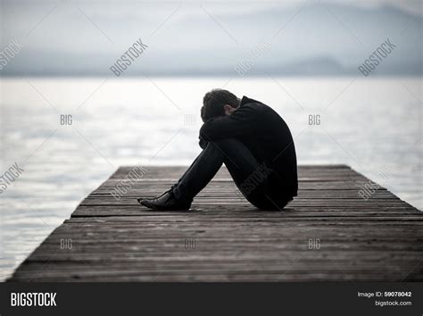 Lonely Sad Man Sitting Image And Photo Free Trial Bigstock