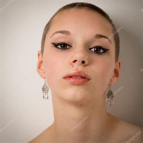 Beautiful Young Teenage Girl With A Shaven Head Stock Photo By ©heijo