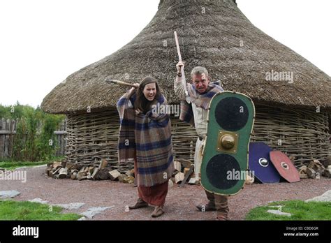 Celtic Characters At The Reconstruction Of The Iron Age Dwelling At The