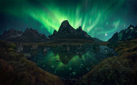 Northern Lights Over Mountains Hd Wallpaper Wallpaper Flare