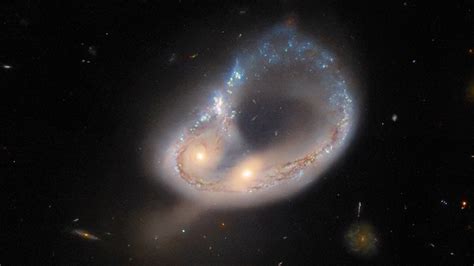 Hubble Snaps Stunning Pictures Of Colliding Galaxies