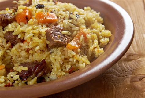 Pilaf Pilaw Plov Rice With Meat In Pan Cooking Process Stock Image