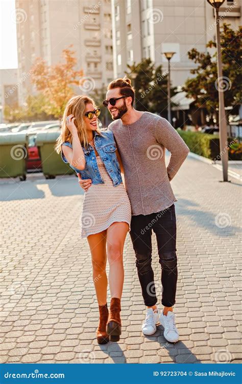 Urban Couple Walking On The Street And Smiling Stock Photo Image Of