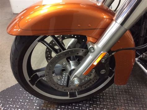 Extras include mustang solo seat with passenger seat pad. 2014 Harley Davidson FLHXS Street Glide Special Amber Whiskey