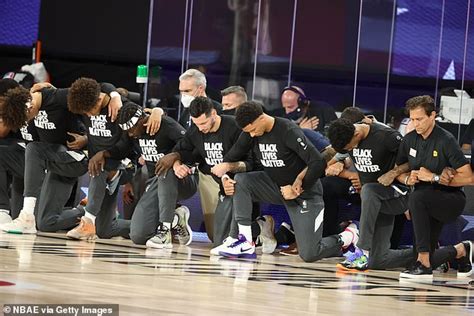 Nba Players Kneel In Protest Of Racism During The National Anthem As The League Re Opens Daily