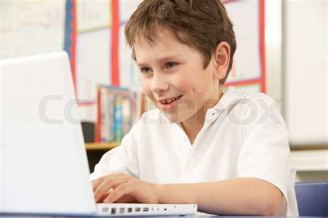 Schoolboy In It Class Using Computer Stock Image Colourbox