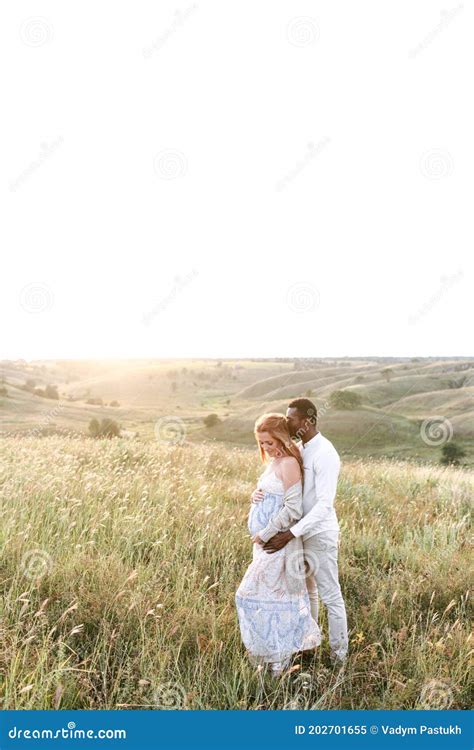 Multiracial Pregnant Couple In The Park Outdoor Stock Image Image Of