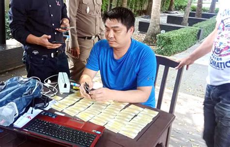 chinese credit card scammer arrested in lumpini by thai police after complaints from banks