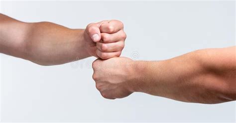 People Bumping Their Fists Together Arms Man Giving Fist Bump Team Concept Stock Image