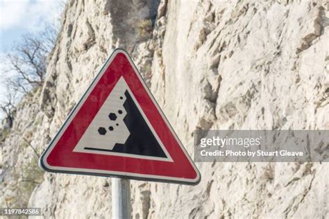 Falling Rock Sign Photos And Premium High Res Pictures Getty Images