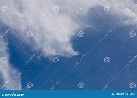 Wispy High Cirrus Clouds In A Blue Sky Stock Photo Image Of Wispy
