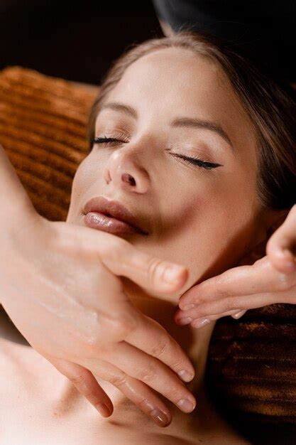 Premium Photo Neck And Face Massage In The Spa Masseur Is Making Facial Beauty Treatments For