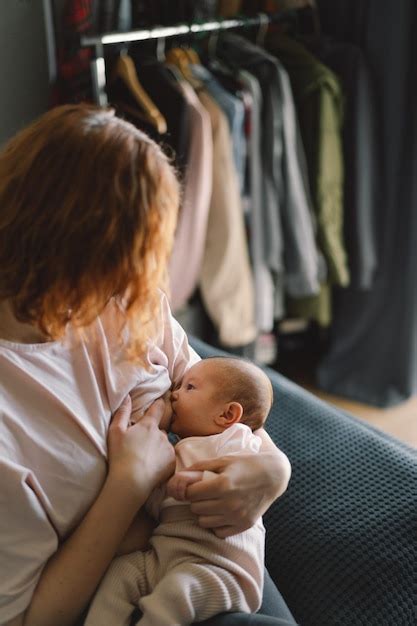 Premium Photo Newborn Baby Girl Sucking Milk From Mothers Breast