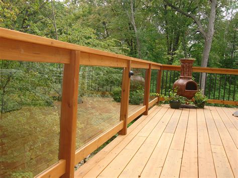 A Leading Minnesota Deck Builder Glass Railing Deck Railings Outdoor Deck Designs Backyard