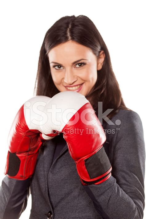 Happy Business Woman With Boxing Gloves On White Background Stock Photo