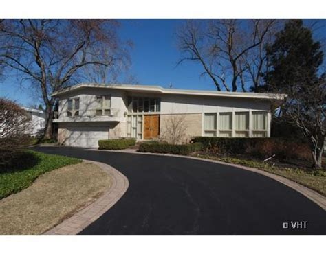 First and second levels have different exteriors to provide more dimension. Modern Property - Joe Kunkel: Mid-Century Glencoe Split-Level