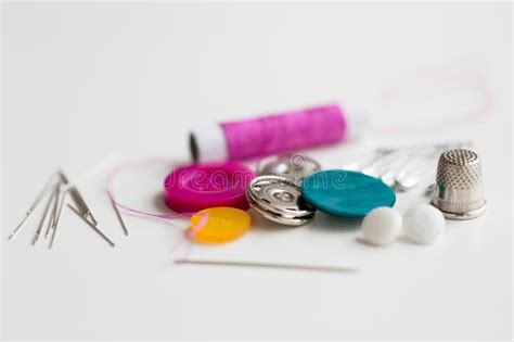 Sewing Buttons Needles Pins And Thread Spool Stock Photo Image Of