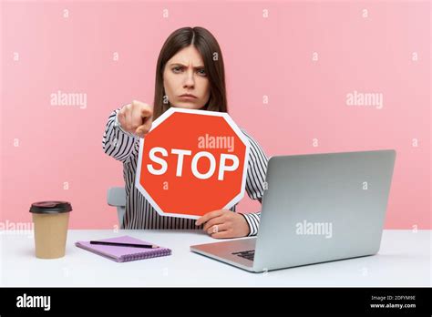 Angry Business Woman Showing Stop Symbol Pointing Finger At Camera