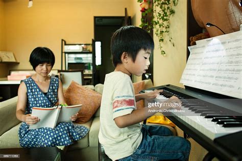 Japanese Mother And Son At Home High Res Stock Photo Getty Images