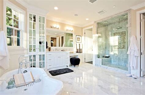 Black marble lines the floors, walls and countertops of this luxurious and traditional bathroom. Luxurious Mansion Bathrooms (Pictures) - Designing Idea