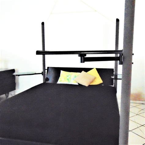 Check out our bunkbeds selection for the very best in unique or custom, handmade pieces from our toddler beds shops. 1980s Canopy Bed Dark Lacquer, Adjustable Shelves, Sormani, Italy For Sale at 1stdibs