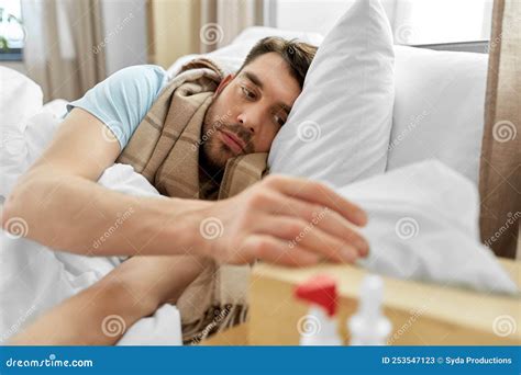 Sick Man Lying In Bed At Home And Taking Tissue Stock Image Image Of