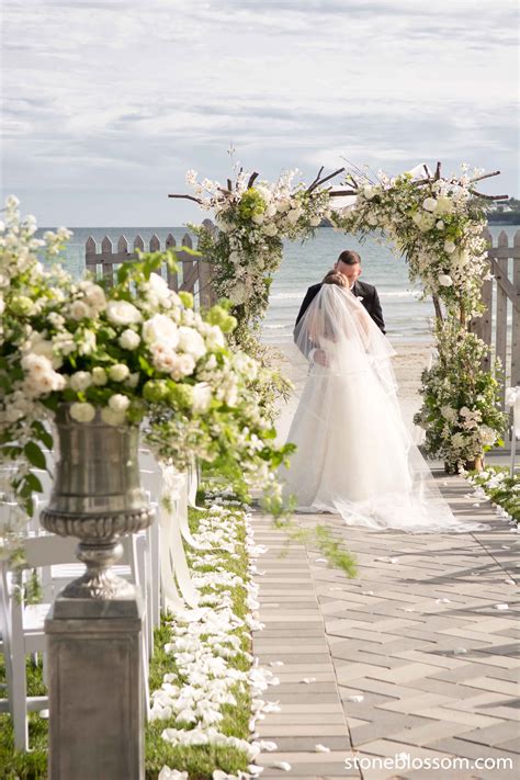 a beautiful seside ceremony at newport beach house we used tons of whites and greens to design