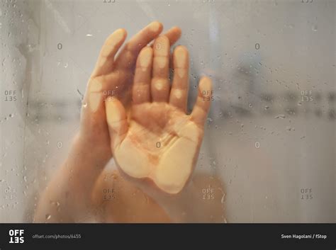 Palms Pressing Against The Glass Of A Shower Stock Photo Offset