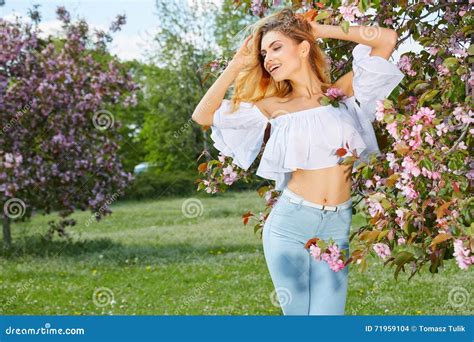 Beautiful Woman In Spring Blossom Trees Stock Photo Image Of Green