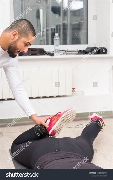 Personal Trainer Instructing Woman How Use Stock Photo 1149654554