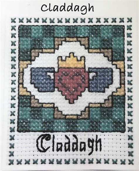 A Cross Stitch Pattern With The Name Claudia On It And An Image Of A Heart