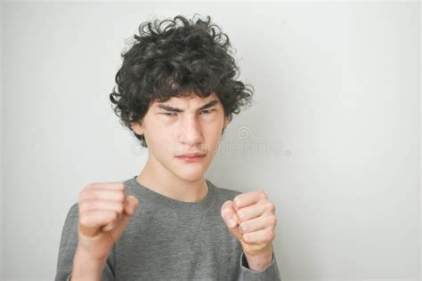 Angry Boy With Fists Raised Ready To Fight Stock Image Image Of Fists