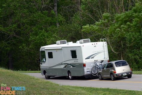 The Ultimate Rv Towing Guide The Pros And Cons Of Flat Towing Four