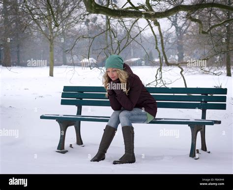Sad Girl Sitting Alone Outside Stock Photos & Sad Girl Sitting Alone Outside Stock Images - Alamy