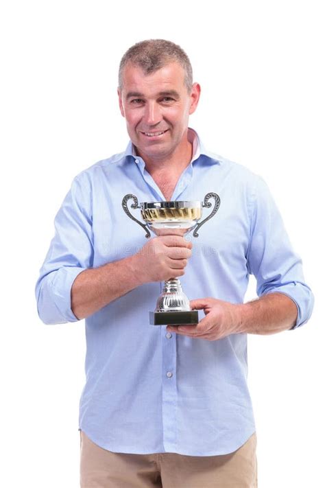 Casual Middle Aged Man Holding Trophy Stock Image Image Of Winner