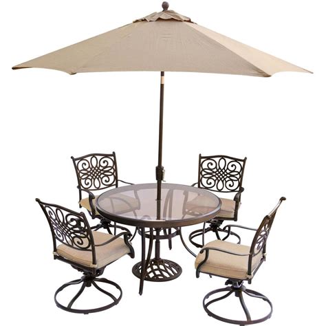It is designed for comfort and durability. Hanover 5-Piece Outdoor Dining Set with Round Glass Table ...