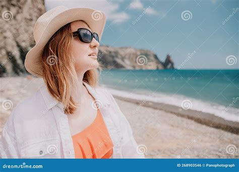 Young Woman In Red Bikini On Beach Blonde In Sunglasses On Pebble Beach Enjoying Sun Stock